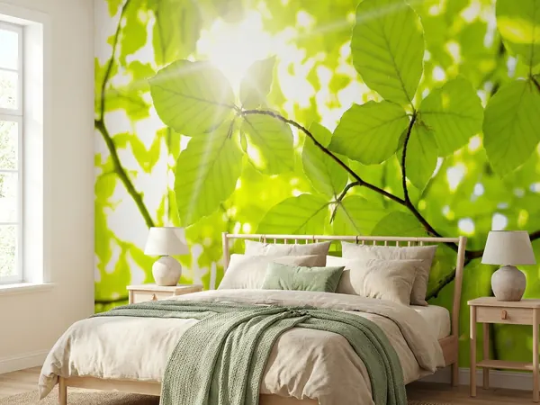 Backlit green leaves wall mural in a bedroom