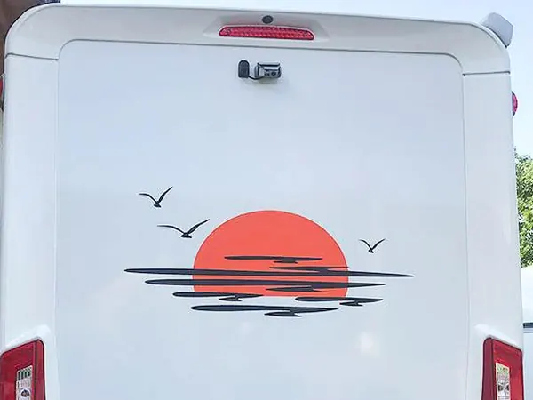 Sunset and seagulls decal on the back of a motorhome