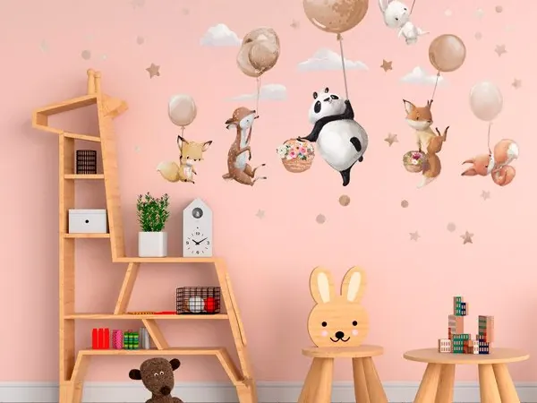 Animals with balloons kids' wall sticker in a pink nursery